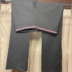 NIKE size XL (16/18) cotton athletic pants. Never worn. Slight flare.